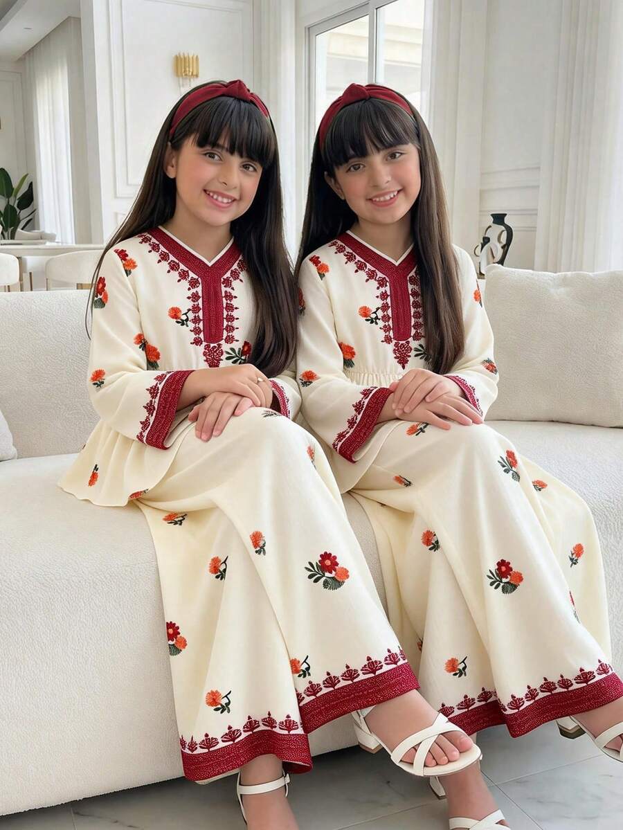 少女米色底红色刺绣套装,端庄优雅,长袖上衣饰以清新花卉印花,喇叭袖+松紧腰设计,搭配垂坠感十足的阔腿裤,保留了精致的传统图案,同时融入了童装的宽松剪裁,展现出纯真与异域风情,适合春、夏、秋季穿着,舒适得体,是中东节日和轻松庆典的理想童装之选。 - 彩色 - 查看 1