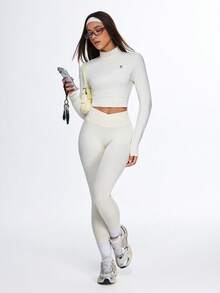 Eassivo Eassivo 女士运动上衣 新款时尚露背瑜伽长袖修身运动上衣 适合户外普拉提训练 - 米色 - 查看 13