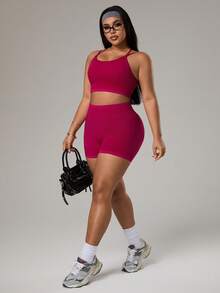 SHEIN Rhythm Era Bộ đồ thể thao không đường may dành cho nữ cỡ lớn, áo ngực và quần short, kiểu dáng thể thao lưng chữ Y, ôm sát cơ thể, thích hợp cho mùa xuân/hè, áo ngực có đệm rời và quần short cạp cao bó sát. - Màu Đỏ Sâu - Xem 5