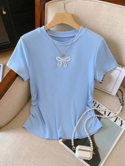 GlowEve CURVE Große Größen einfarbiges minimalistisches Tageskleider T-Shirt mit Schmetterling- und Perlendekor, Kurzarm