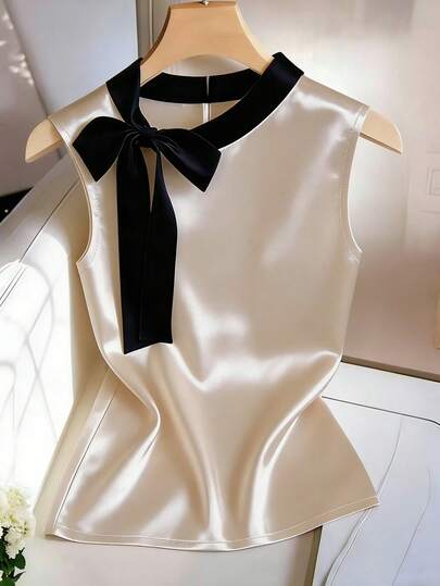 Franclia Elegante blusa de estilo francés con cuello redondo y sin mangas, con lazo negro contrastante, color albaricoque, para mujer, primavera/verano