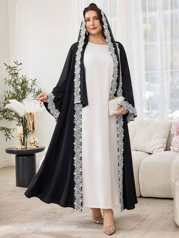 Al Najma Bata elegante y minimalista de unicolor para mujer, estilo árabe (abaya) con adorno floral y mangas acampanadas - Negro - Añade 5