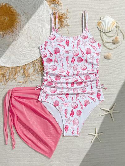 SHEIN Teen Girls One-Pieces: Blue Shell One-Piece Swimsuit With A Vacation Style, Paired With A Net Skirt, Is Fashionable, Casual, Exquisite, And Elegant.  Suitable For Swimming, Vacation, Beach, Pool, Photo Shoot, Summer Gift Girl Swimsuit Girls Beachwear Swimsuit With Sarong One Piece Swimsuit Girls Swimsuit Set Teen Girl Swimwear Sarong Skirt Girl One Piece Swimsuit Swimsuit With Sarong Skirt Sea Shell Print Swimwear