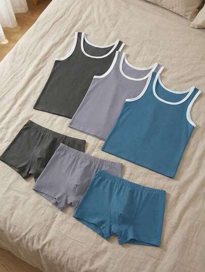 Bộ 6 món quần lót và áo lót cho bé trai, màu trơn, chất liệu cotton pha, màu trắng, xám, xanh navy, dành cho bé từ 4-7 tuổi.