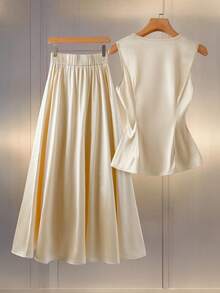 GlowEve 女士优雅收腰V领无袖针织上衣搭配喇叭中长裙套装，仿丝绸面料，适合日常通勤 - 香檳色 - 查看 2