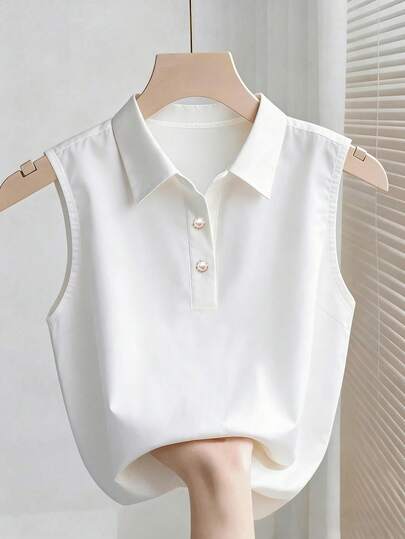 Franclia Minimalist White Sleeveless Polo Collar Top, Delicate Pearl Button Decor, Loose Cropped Blouse, Versatile For Commute & Daily Wear, Flattering Drape Fabric Sleeveless Top, Elegant Lapel Design With Pearl Buttons