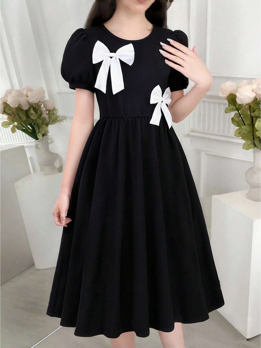 SHEIN 女童简约优雅黑色中长连衣裙，饰有蝴蝶结，圆领泡泡袖，A字腰身，适合日常、通勤、派对等场合。 - 黑色 - 查看 1