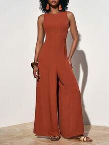 Zivah Bộ jumpsuit nữ dáng rộng không tay cổ tròn màu vàng nâu, phong cách boho, màu sắc tươi tắn, phối ren xếp ly kim loại ở lưng, dành cho mùa xuân/hè 2026. Thích hợp cho các hoạt động thường ngày, dự tiệc, du lịch, phong cách boho, đi biển, trang phục sân bay, trang phục ăn trưa, lễ hội và trang phục dự đám cưới, kỳ nghỉ, phong cách phương Tây, du mục. - Rỉ Nâu - Xem 3