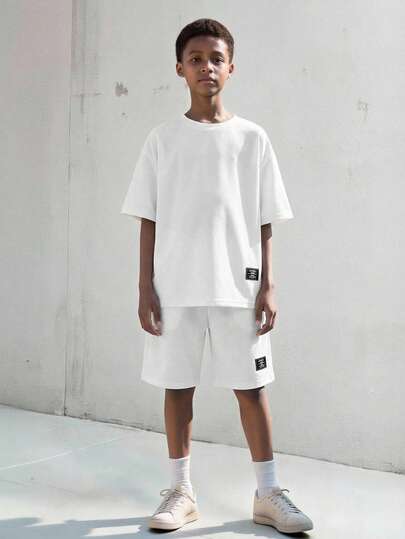 SHEIN Vacaura 2pcs/Set Tween Boy Casual Round Neck Short Sleeve Top And Shorts Set