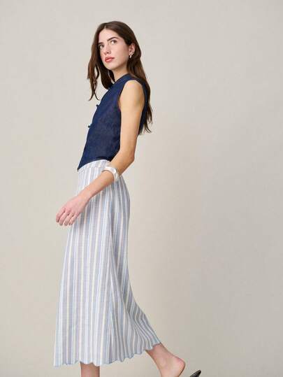 Nöista Striped Midi Skirt Features A High Waist And Vertical Stripes For A Slimming Effect. Women Set, Spring, Summer Outfit For Women, Spring Look, Casual Outfit, Vacation Outfits.