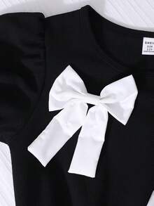 SHEIN 女童简约优雅黑色中长连衣裙，饰有蝴蝶结，圆领泡泡袖，A字腰身，适合日常、通勤、派对等场合。 - 黑色 - 查看 6