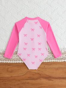 Sparklyn Young Girls Peach Pink Bowknot Striped Decor Cute Elastic Comfortable One-Piece Swimsuit, Suitable For All Seasons Pink Long Sleeve Swimsuit Girl Pink Swimsuit Young Girl Long Sleeve Swimsuits Pink Long Sleeve Swimsuit Pink Swimsuit Long Sleeve Swimsuit Bow Print Swimsuit Girl Rash Guard Long Sleeve Swimsuit Swim Suits Girls Pink Rash Guard Pink Swim Shirt For Girls - Baby Pink - View 2