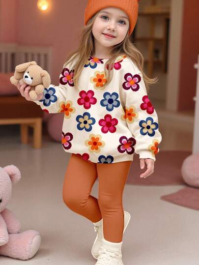 SHEIN Bộ đồ Happikins màu trắng kem và cam caramel, họa tiết hoa retro nhiều màu sắc dễ thương, chất liệu dày dặn, mềm mại, ấm áp dành cho bé gái, gồm áo nỉ dài tay cổ tròn và quần, thích hợp cho mặc hàng ngày vào mùa thu/đông, đi học, nghỉ lễ, và năm mới.