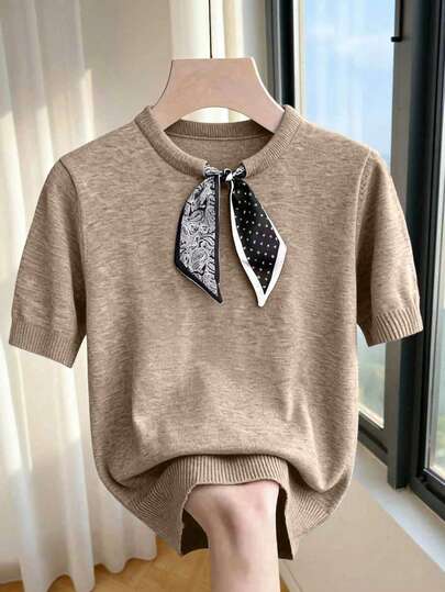 Franclia Nueva blusa de punto de cuello redondo, manga corta y estilo minimalista casual. Diseño básico con elementos de paisley y lunares, estilo francés chic, silueta corta, versátil para vestidos o pantalones, con ribete acanalado y diseño de cuello con lazo de contraste.