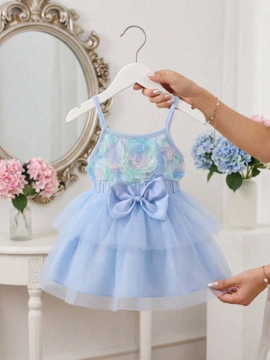 SHEIN 女婴夏季两件套，返校季适用，适合6个月至3岁宝宝，蓝色玫瑰网纱无袖上衣搭配松紧腰蝴蝶结半身裙，柔软可爱，适合春夏休闲穿着，也是一份贴心的礼物。 - 藍色 - 查看 1