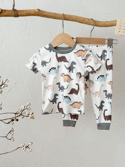 SHEIN 2pcs Baby Boys/Girls Pajama Set, White Crew Neck Short Sleeve T-Shirt And Elastic Waist Pants, Funny Dinosaur Pattern, Comfortable Casual Sleepwear For Spring And Summer