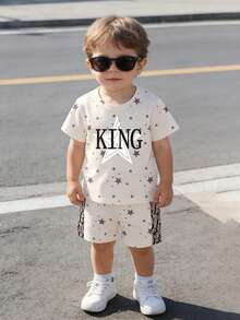 两件套男童休闲时尚套装，包括印花星星字母图案T恤和字母撞色短裤，适合春夏季节、休闲、户外、运动、上学等场合穿着。 - 彩色 - 查看 4