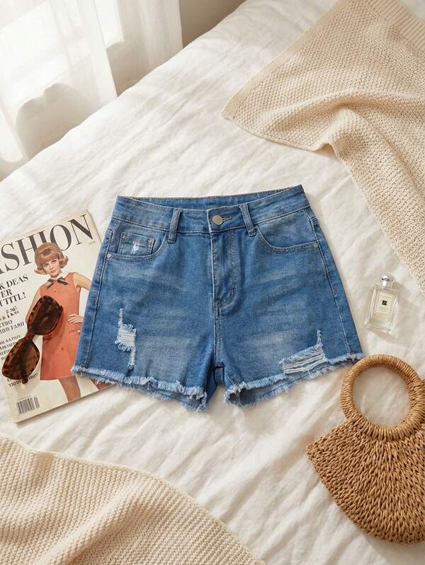 Shorts de mezclilla con bordes desflecados, diseño elástico y cómodo, estilo casual y versátil