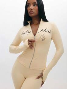 BABYPHAT Atasan Wanita Lengan Panjang dengan Resleting, Motif Teks, dan Detail Resleting - Krim - View 8