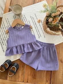 SHEIN Bộ đồ đôi cho bé gái màu tím nhạt dễ thương, có nơ trang trí, kiểu dáng thoải mái, thích hợp cho kỳ nghỉ, gồm áo hai dây và quần short, màu xanh tím nhạt, kiểu dáng hở lưng, thích hợp cho trẻ em. - Màu tím - Xem 2