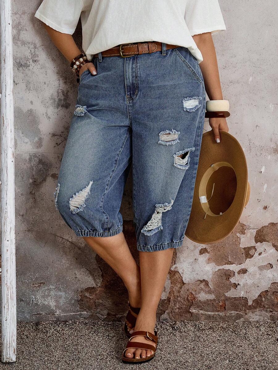 EMERY ROSE Quần jean denim rách dài 7/8 cỡ lớn, quần capri denim rách cỡ lớn dành cho nữ - quần jogger cạp chun, trang phục thường ngày mùa hè, quần capri denim rách cỡ lớn dành cho nữ phong cách đường phố Y2K, quần capri denim rách thanh lịch dành cho nữ - quần jogger cạp chun, quần capri denim màu sáng cỡ lớn dành cho nữ, thiết kế cạp cao, chi tiết rách nhiều, cạp chun phía sau tạo sự thoải mái cả ngày và gấu quần kiểu jogger. Chất liệu denim mềm mại, co giãn, nhiều túi, hoàn hảo cho trang phục hàng ngày mùa hè, kỳ nghỉ, phong cách đường phố Y2K thường ngày, quần capri denim, denim rách, cạp chun, quần jogger, quần mùa hè, Y2K, phong cách, thời trang đường phố thường ngày. - Màu xanh lam - Xem 1