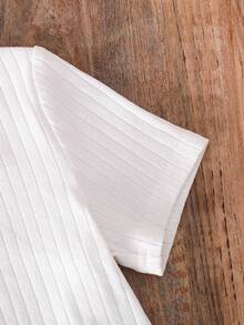 Conjunto de 2 peças para menina: camiseta de malha lisa com gola redonda e vestido curto floral. - Preto e Branco - Ver 8