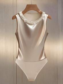 Franclia 极简通勤风圆领针织面料铆钉无袖修身优雅女士连体衣 - 杏色 - 查看 1