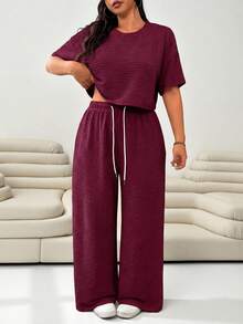 Solflare Women's Plus Size Solid Color Round Neck Short Sleeve Top And Drawstring Waist Wide Leg Pants Casual 2 Piece Set, Summer Outfits - Rusty Rose - View 1