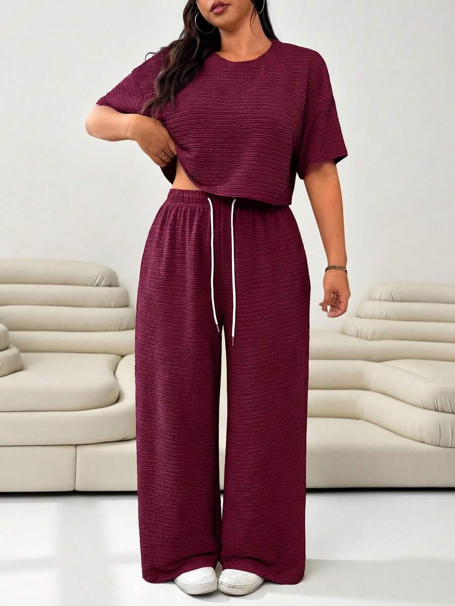 Solflare Women's Plus Size Solid Color Round Neck Short Sleeve Top And Drawstring Waist Wide Leg Pants Casual 2 Piece Set, Summer Outfits - Rusty Rose - View 1