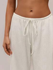 SHEIN Tall CURVE Quần ống rộng cạp cao màu trắng mơ dành cho nữ cỡ lớn, kiểu dáng thoải mái, đa năng, thích hợp mặc hàng ngày. Cạp cao giúp bạn trông thon gọn và chân dài hơn, phù hợp với phụ nữ cao. Cạp cao giúp bạn trông thon gọn và chân dài hơn, thích hợp cho phụ nữ cao. Phù hợp cho mọi mùa và mọi dịp. - Màu be - Xem 9