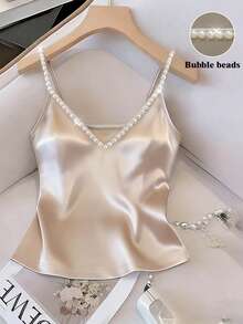 Franclia 新款女士优雅时尚缎面珍珠吊带背心，适合通勤、派对及各种场合，夏季背心，浅色背心，白色上衣，女士优雅背心，夏季上衣，女士夏季服装，女士优雅上衣，派对上衣，优雅上衣，珍珠吊带上衣，串珠上衣，裸色上衣，丝绸吊带背心，缎面上衣，女士吊带背心，珍珠吊带背心，女士夏季上衣，缎面吊带背心，珍珠吊带背心，V领吊带背心，优雅吊带背心 - 杏色 - 查看 1