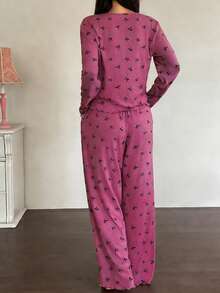 DAZY Bộ đồ ngủ nữ 2 món gồm áo khoác cardigan dài tay in nơ và quần ống đứng. - Màu Hồng Tươi - Xem 2