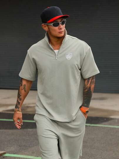 DAZY Men's Letter Print Short Sleeve 1/3 Zip Collar Shirt And Shorts Set, Summer