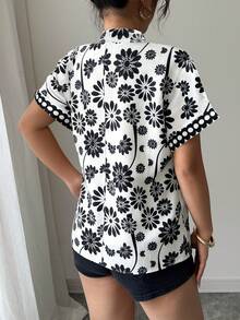 Elenzga Women's Elegant Fashion Casual Comfortable Charming Retro Romantic Holiday Short Sleeve V-Neck Loose Printed Blouse (Random Print) - Black and White - View 2