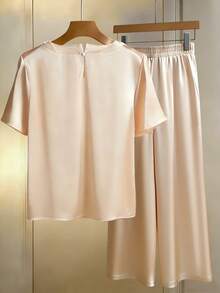 Franclia Vestido elegante de cuello redondo/camisa decorado con tela de satén con perlas, corte holgado adecuado para ir al trabajo, uso diario, que muestra un aspecto elegante y grácil. Vestido de verano, fiesta, playa, elegante casual, romántico, Día de San Valentín, cita, temporada de graduación, ropa casual de moda para ir al trabajo, atuendo de oficina empresarial, conjunto de 2 piezas de pantalón de pierna ancha versátil y de moda para uso diario, ropa profesional de maestra urbana. - Albaricoque - Ver 2