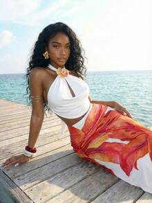 Slaydiva Bộ đồ hai mảnh nữ phong cách Boho thanh lịch, hở lưng, buộc dây cổ, họa tiết hoa, dành cho kỳ nghỉ hè 2026, gồm áo tank top và chân váy midi in hoa. Thích hợp cho mặc hàng ngày, kỳ nghỉ, du lịch, hẹn hò, mùa cưới, trang phục dự tiệc cưới, đi biển, phong cách miền Tây, du mục. - trắng - Xem 8