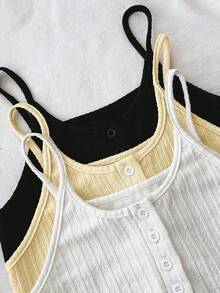 SHEIN Glamour Áo hai dây cổ điển đa năng kết hợp với kiểu dáng crop top hở eo, được trang trí bằng hàng cúc phía trước giúp giảm sự nhàm chán khi phối đồ. Có thể mặc riêng hoặc phối cùng quần jeans, chân váy để tạo vẻ ngoài thường ngày; cũng thích hợp làm áo lót để mặc cùng áo sơ mi, áo blazer, áo cardigan khi đi làm, hẹn hò hoặc đi chơi. - Nhiều màu - Xem 7