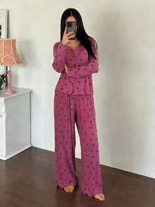 DAZY Bộ đồ ngủ nữ 2 món gồm áo khoác cardigan dài tay in nơ và quần ống đứng. - Màu Hồng Tươi - Xem 5