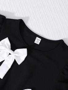 SHEIN 女童简约优雅黑色中长连衣裙，饰有蝴蝶结，圆领泡泡袖，A字腰身，适合日常、通勤、派对等场合。 - 黑色 - 查看 4