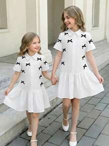 Elladie kids 女童白色中长款短袖喇叭袖蝴蝶结纽扣前开襟甜美休闲连衣裙，夏季两件套女童白色休闲连衣裙，女童连衣裙，儿童女童星形衬衫半身裙两件套，儿童水手服连衣裙，女童黑白教堂连衣裙，儿童白色百褶连衣裙，女童亲子装，姐妹亲子装，白色可爱连衣裙，女童连衣裙，白色印花连衣裙，女童休闲连衣裙，女童翻领连衣裙 - 白色 - 查看 3