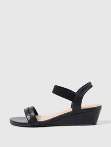 Sleekvia 女士夏季圆头黑色压纹弹力带简约通勤日常百搭职业舒适坡跟凉鞋 - 黑色 - 查看 1