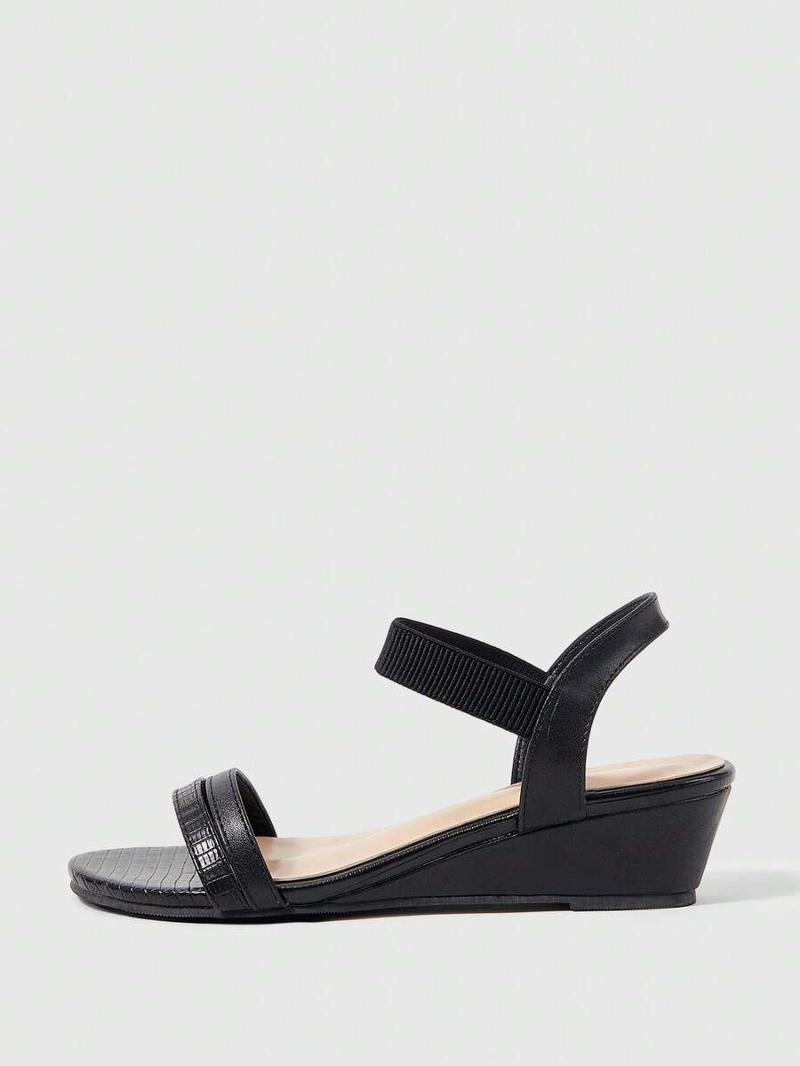 Sleekvia 女士夏季圆头黑色压纹弹力带简约通勤日常百搭职业舒适坡跟凉鞋 - 黑色 - 查看 1