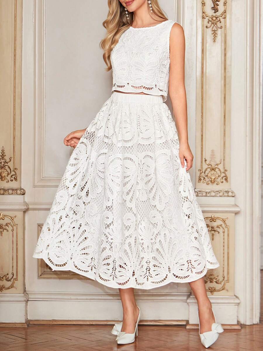 Amorya Bộ đồ 2 món dành cho nữ, màu trơn, chất liệu ren tan trong nước, gồm áo vest và chân váy. - trắng - Xem 1