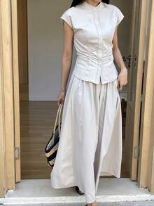 Livesso 白色无袖高领露脐上衣和休闲半裙两件套，适合办公室、通勤、度假、派对、夏季穿着。 - 白色 - 查看 4