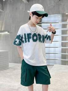 2pcs/Set Tween Boy White Summer Casual Graphic City Break Korean Style Loose Fit Round Neck Short Sleeve T-Shirt And Shorts Set For School Sports - Green - View 5
