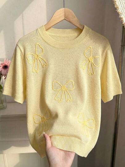 Elenzga Lente Nieuwe Losse Casual Veelzijdige Boterbloemgele Gebreide Top met Ronde Hals en Korte Mouwen en Geborduurd 3D Strikje Decoratief Patroon voor Dames