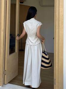 Livesso 白色无袖高领露脐上衣和休闲半裙两件套，适合办公室、通勤、度假、派对、夏季穿着。 - 白色 - 查看 2