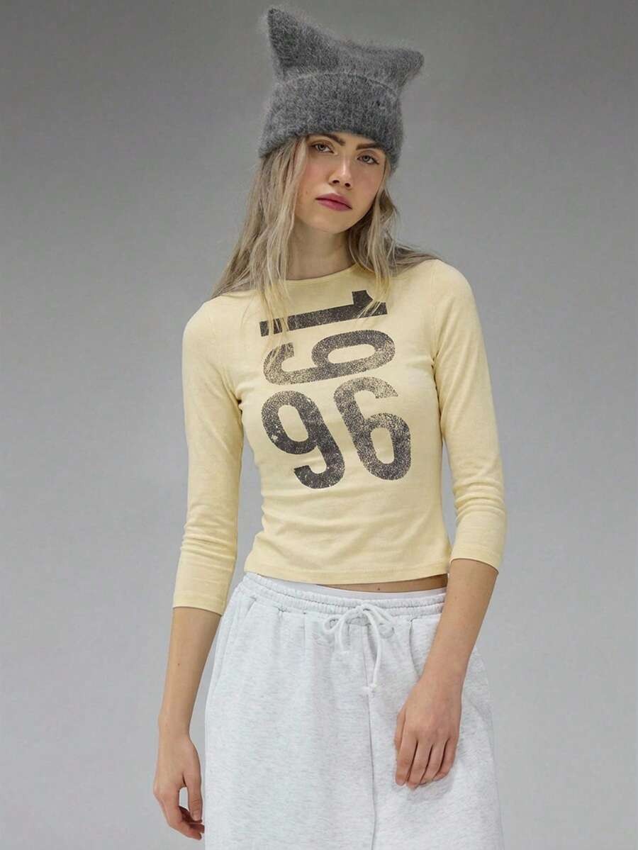 COUREZ Long Sleeve Jersey Top With Front Graphic Print /Y2K Long Sleeve Tops Going Out Tops Women Tops Winter Clothes For Women Blue Top Graphic Tees Women Cute Tops Summer Tops Summer Outfits - Pale Yellow - View 1