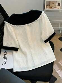 Franclia 2026新款女士短袖彼得潘领衬衫，黑白纹理面料，蕾丝饰边，纽扣前襟，休闲通勤简约度假上衣 - 黑與白 - 查看 2