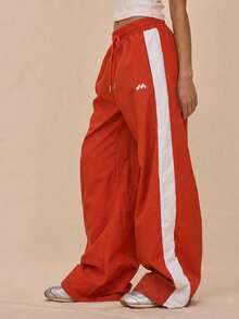 MUSERA Quần thể thao ống rộng bằng nylon có dây rút ở eo, phối màu tương phản, chỉ bao gồm quần. Thích hợp cho sân bay, phong cách thường ngày. Phù hợp cho Giáng sinh, mùa đông và mùa hè. - trái cam - Xem 3